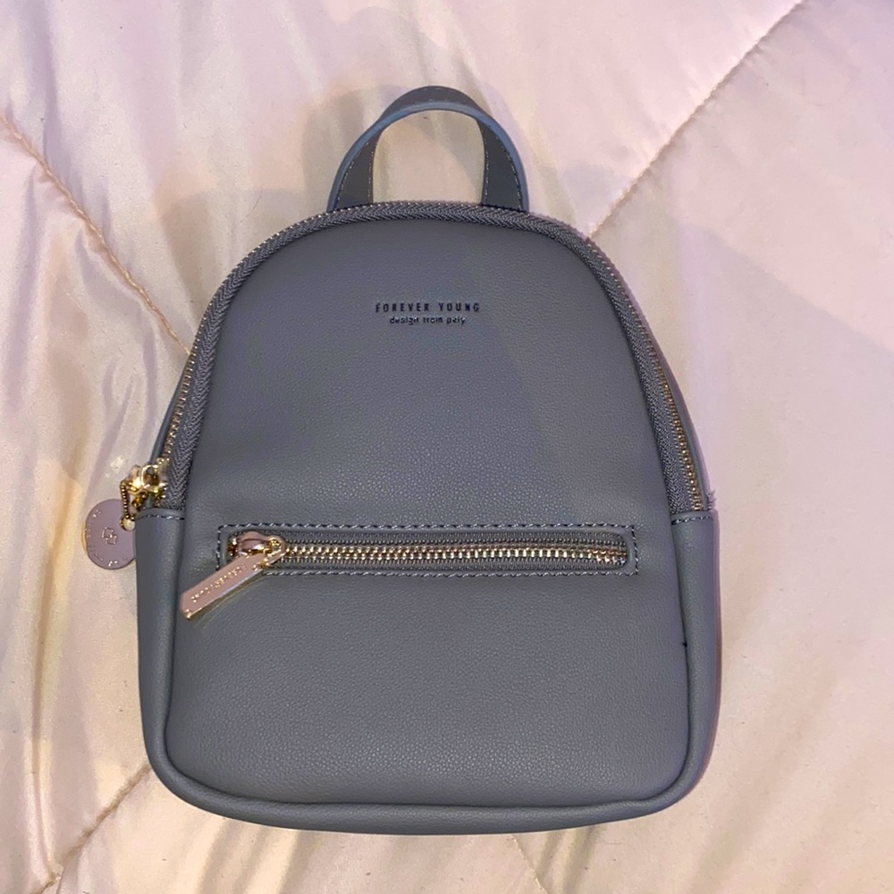 Mini bag with four pockets, great for a fashionable accessory